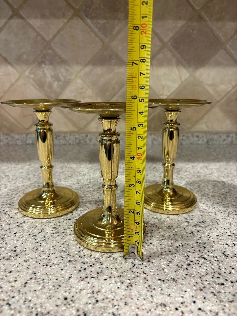 Polished brass pillar candle holder. Set Of 3